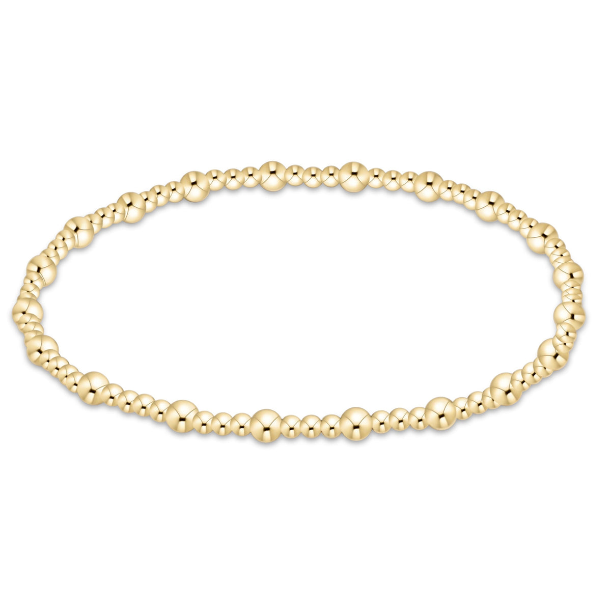 A gold beaded stretch bracelet with alternating large and small polished round beads, displayed in a horizontal oval shape on a clean white background.