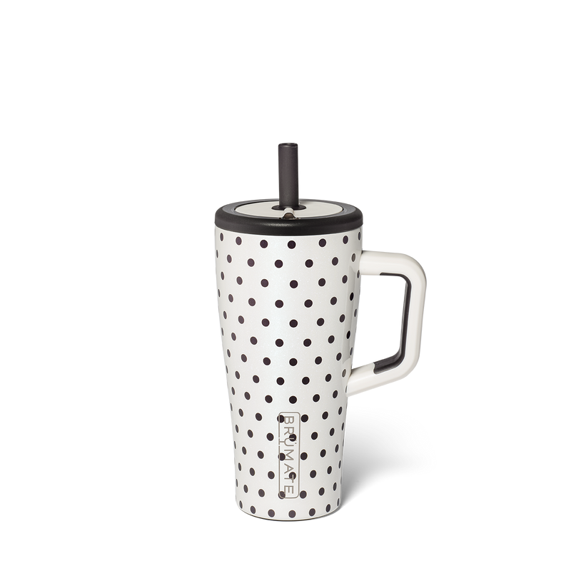 Floral-patterned mug with a handle and straw on a white background